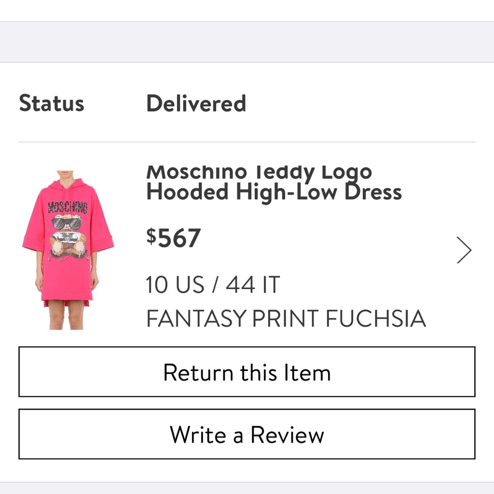 Moschino sweater dress . 1 year old . Worn twice .